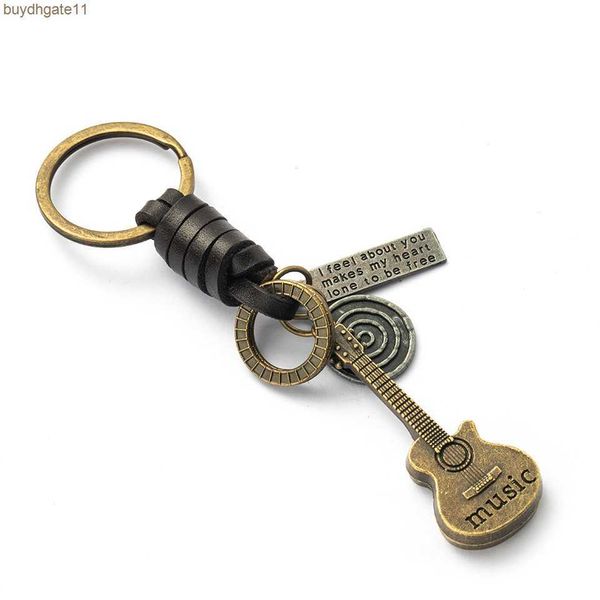 

1477 key rings key chain creative guitar leather key chain woven leather key knapsack pendant, Slivery;golden