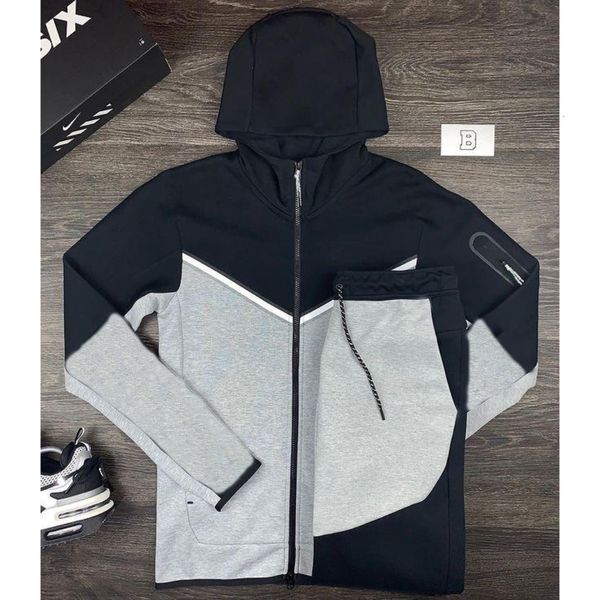 

mens tracksuits butz casual suit fashion 2 pcs tracksuit striped coat pants sportswear summer tracksuit 230815, Gray