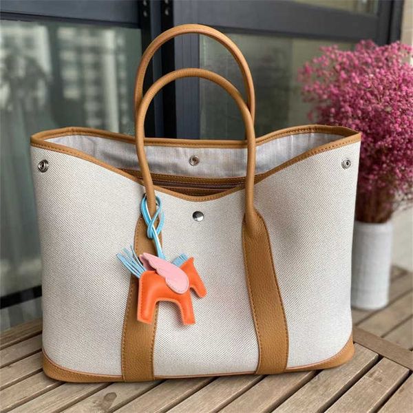 

luxury h ermes party garden handbags for women 2023 new genuine leather womens bag canvas with layer cowhide fashion handheld one sh with re