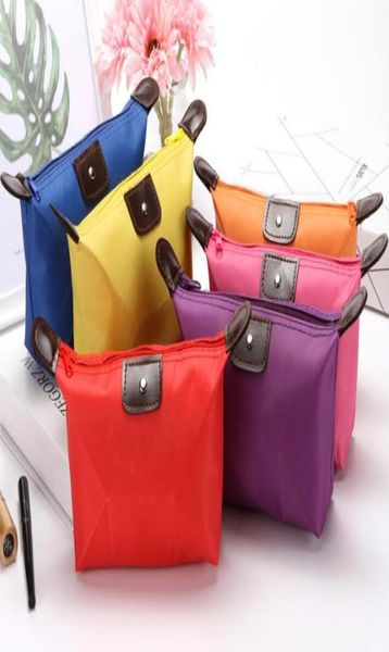 

lady makeup pouch waterproof cosmetic bag clutch toiletries travel kit casual small purse candy sport 10 colors 20195100603