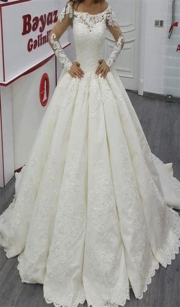 

2017 bateau ball gown wedding dresses illusion long sleeves major lace appliqued floor length sweep train bridal gowns6793155, White