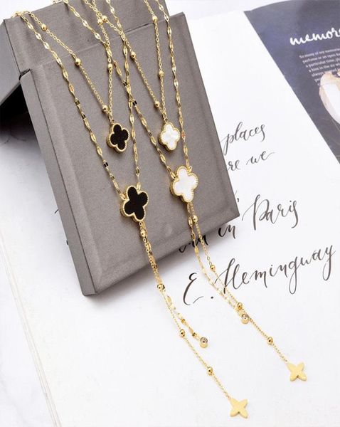 

european and american trendy jewelry black and white doublelayer doublesided fourleaf flower necklace presbyopic tassel pendant4013905, Silver