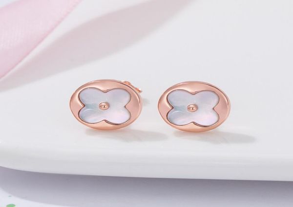 

stud shell round fourleaf clover earrings korean version of ins style fashion fritillary earrings9957306, Golden;silver