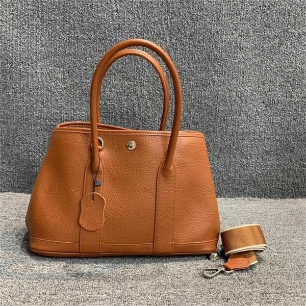 

totes 7a garden party handbag genuine leather genuine leather korean version versatile layer cow leather portable one-shoulder simpleqq with