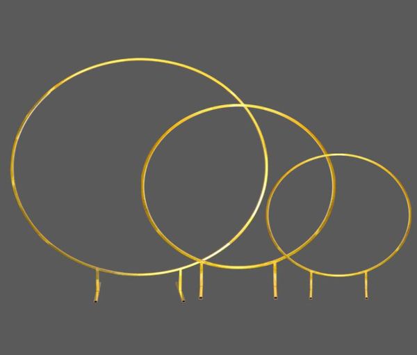 

shiny gold wedding decoration arches flower stand floral balloons metal rack circle background wrought iron shelf decorative party4101977