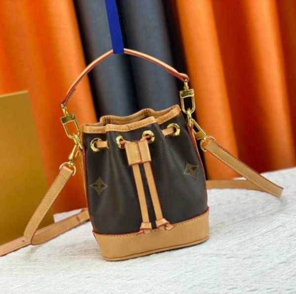 

luxury womens nano mini bucket bag designer bags empreinte leather handle women handbag stardust neonoe drawstring strap shoulder crossbody