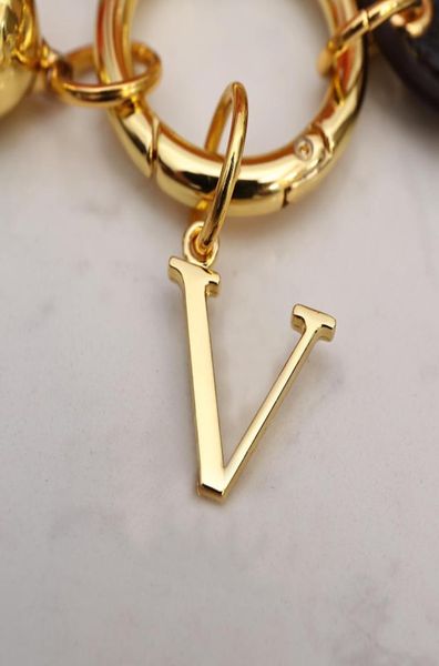 

fashion leather keychain luxury designer gold metal ring key buckle classic letter pendant keychains bell keys orname8558424, Slivery;golden