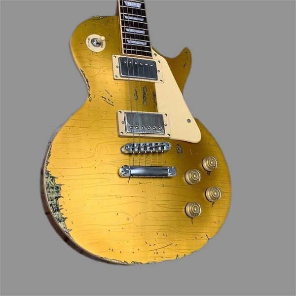 

factory agedheritage nitro finish electric guitar, body and neck a piece of gold