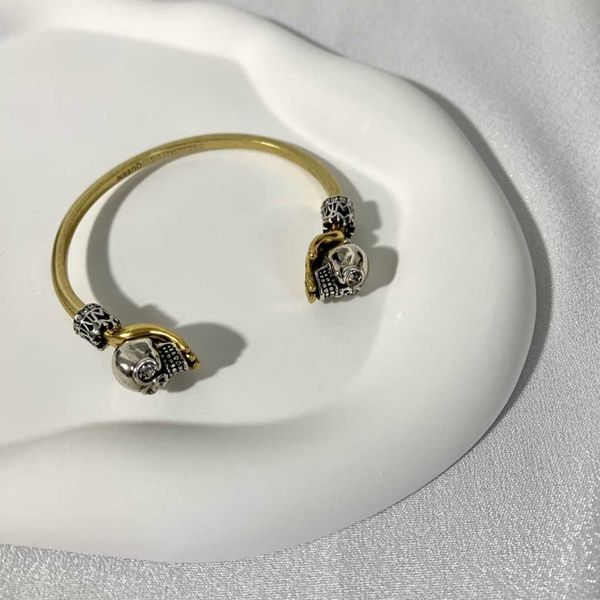 

fashion designer alexander queen old wheat ghost hand skull bracelet female personality temperament color matching palm support open bracele, Silver