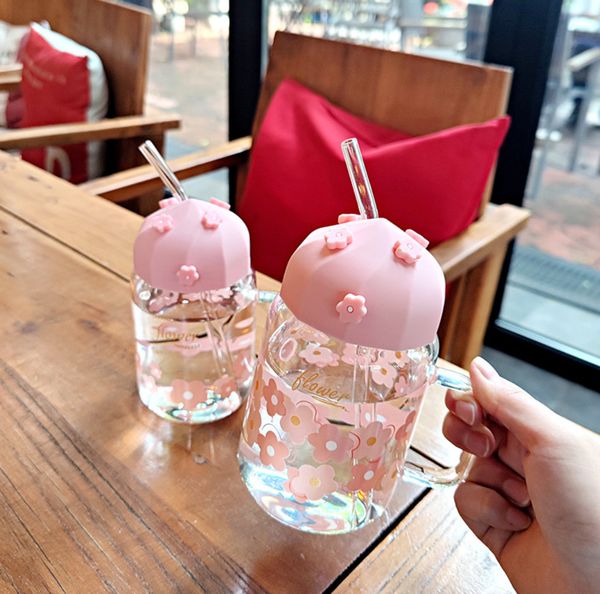 

the latest 17oz cherry blossoms covering the glass coffee mug, many style choices, support customization of any logo