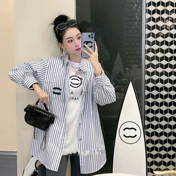 

designer spring and summer the latest vertical striped shirt for women spring harbor style loose casual long-sleeved shirt temperament women, White