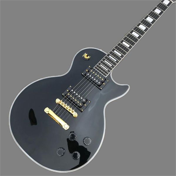 

rosewood electric guitar, black guitar, gold hardware, electric guitar