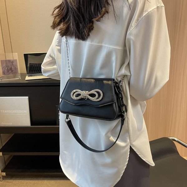 

Sales factory women shoulder bags 5 colors simple and versatile solid color flat leather handbag flip Western style backpack sweet bow buckle chain bag 5549#, Image color-5549#