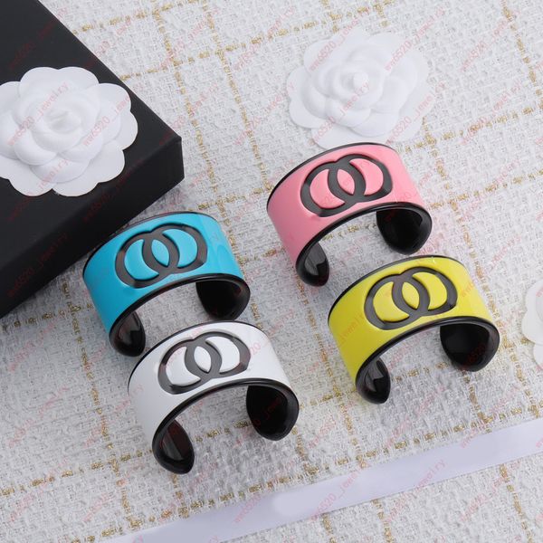 

designer alphabet acrylic wide cuff bracelets, casual fashion item, white/yellow/blue/pink 4 colors can be selected, sports, christmas, with