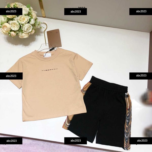 

new tracksuits kids designer clothes baby summer outdoors sets 2pcs logo printed short sleeved t-shirt and patchwork shorts, White