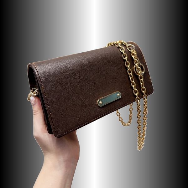 

designer chain bag wallet onchainlily gold-color hardware flap closure removable chain m82509