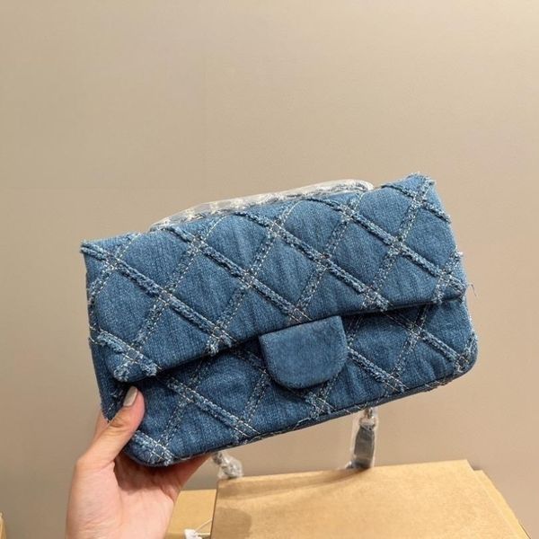 

denim bag quilted designer bag saddle bag flap bag vintage cc handbag bag dark blue denim silver chain hardware shoulder straps designer wom