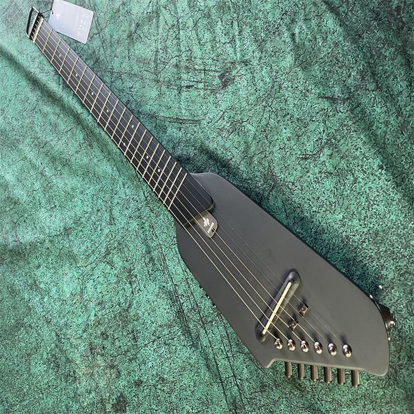 

convenient to carry, light steel string, black matte acoustic guitar, travel portable, detachable, headless wooden guitar, silent effect