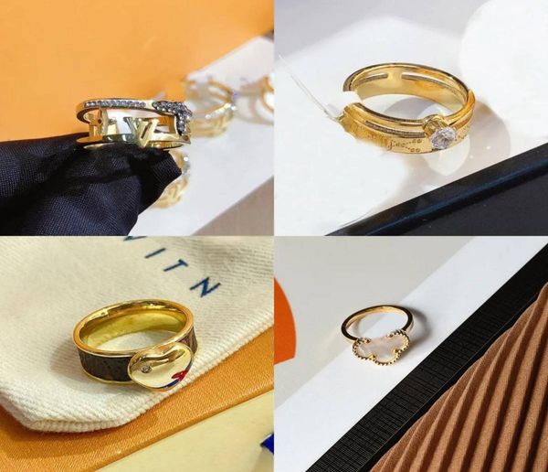 

luxury ring jewelry designer rings women wedding love charms never fade supplies black white 18k gold plated stainless steel fine 5301801, Slivery;golden
