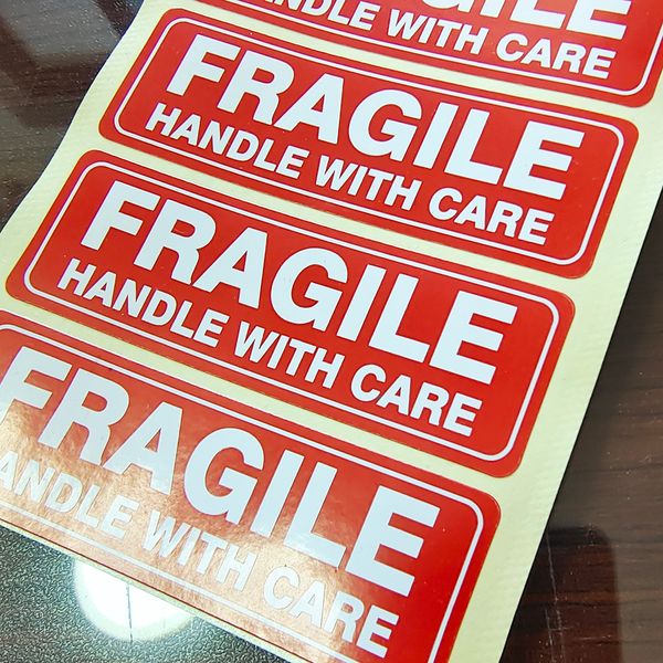 

300pcs 76x25mm FRAGILE HANDLE WITH CARE Self-adhesive Shipping Safety Label Sticker Package Protection Reminder Paper Tag