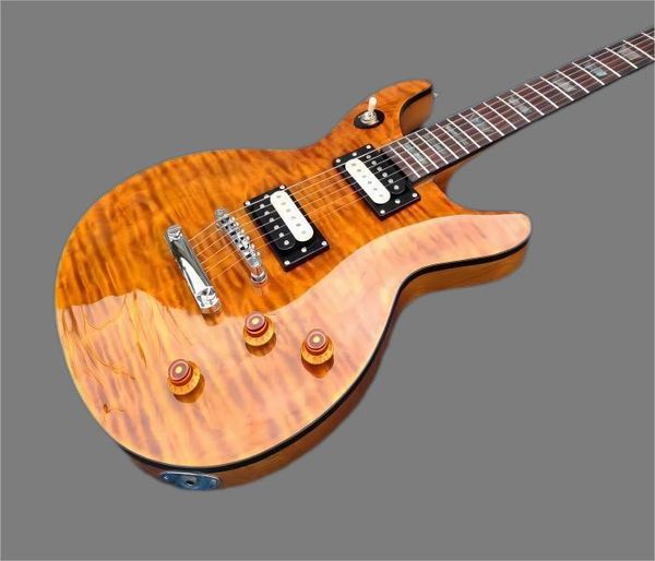 

custom tak matsumoto signature quilted maple orange electic guitar abalone trapezoid inlay, black body binding, tuilp tuners, chrome hardwar