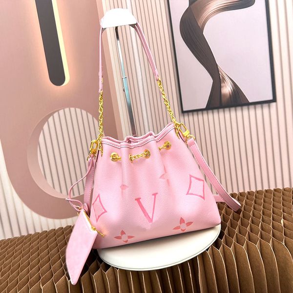 

stylish embossed leather bag in a gradient tone to light up any seasonal look dual handle detachable crossbody strap lift 28x20x11.5