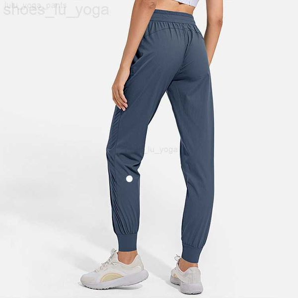 

lull women jogging yoga ninth pants pocket fitness soft high waist hip lift elastic casual pants drawstring legs sweatpants