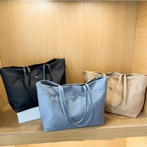 

whole p luxury designer brands shopping bags women triangle label waterproof leisure travel bag large capacity nylon mommy tot203x