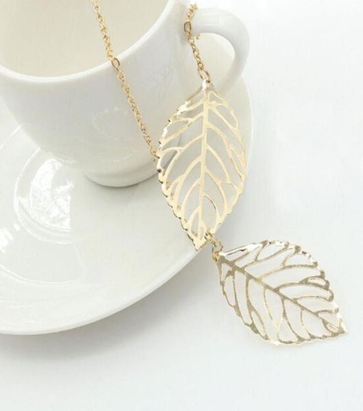 

vintage women silver gold charm chain necklace hollow leaf clavicle necklace two leaves pendant necklace jewelry7696150