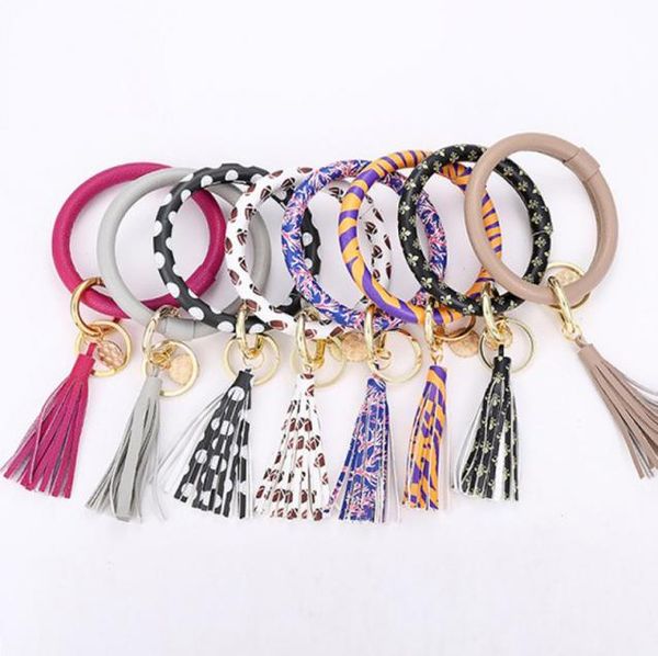 

kimter key holder fashion solid color keychain summer big round wristlet bracelet tassel pu leather o shape keyrings wristlets ban5095185, Slivery;golden