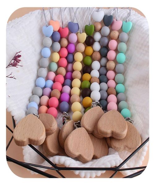 

10 colors new love heart wood pacifier clip baby diy creative pacifier chain cartoon silicone beads wood pacifier holders m31934354879