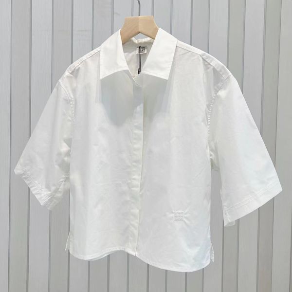 

toteme white embroidered logo shirt short loose fitting short sleeved shirt top