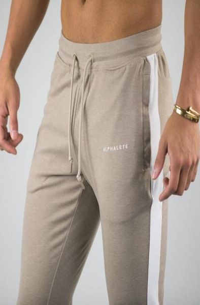 

alphalete brand autumn winter fitness men gyms pants fashion cotton pencil pants bodybuilding trousers jogger5415280, Black