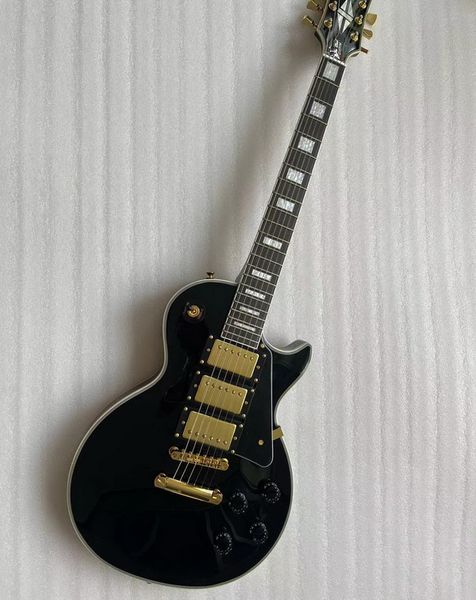 

standard electric guitar, black and silver, well built, shipping in 3 days