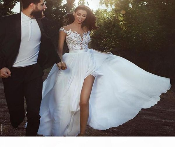 

aline chiffon wedding dresses see through jewel neck lace appliques sleeveless bridal dress 2018 fashion side split wedding8684211, White