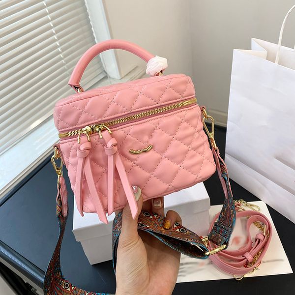 

designer womens mini makeup bag leather diamond hardware metal buckle beautifully embroidered luxury handbag adjustable shoulder strap cross