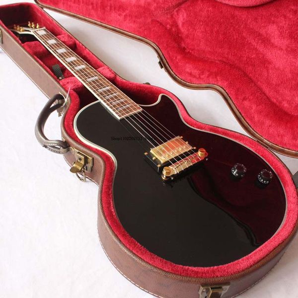 

custom electric guitar, black finish, 1 set of bridge pickups, gold plated parts,