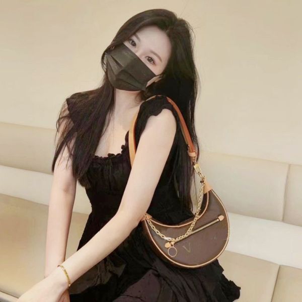 

luxury designer ring bag, horn bag, shoulder wanderer designer wallet, underarm cosmetics, half moon shaped stick, underarm handbag, crossbo