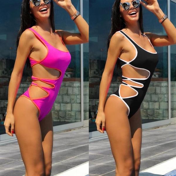 

hollow one piece swimwear solid bikini swimsuit women female edging color swimming suit pierced bikinis bathing one-piece sui2397