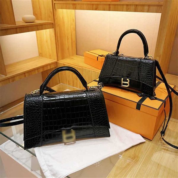 

2023 new high end crocodile pattern handheld hourglass bag for women's small market design fashion versatile one shoulder crossbody bag