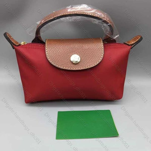 

2023 handbag clearance 95% off wholesale makeup bags heart purse handbag luxury crossbody spring summer borse cowhide mini women dumplings b, Red;black