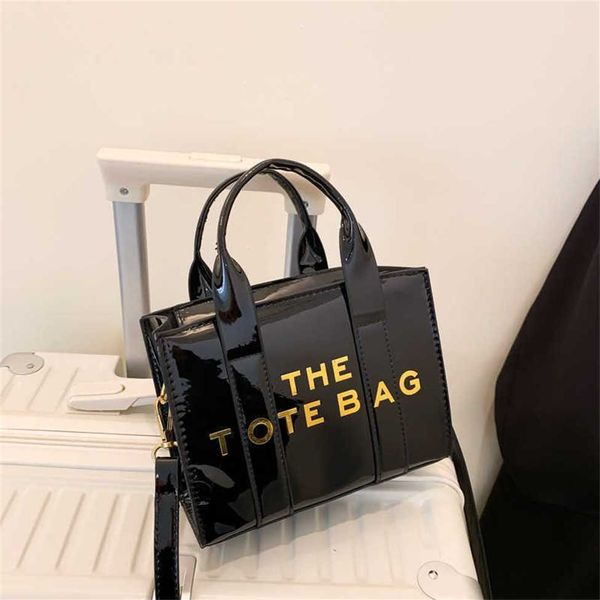 

2023 new bright leather simple tote bag tote bag one shoulder diagonal straddle handheld women's bag 70% designer outlet sale