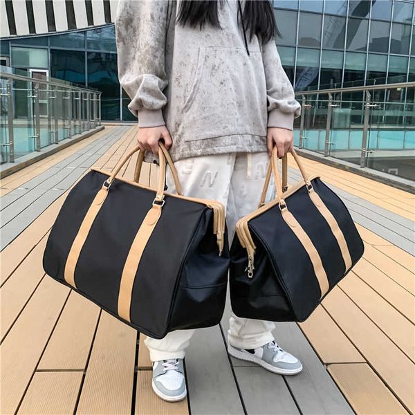 

large bag female large capacity travel super large short distance travel bag fashion go out handbag male luggage bag waterproof