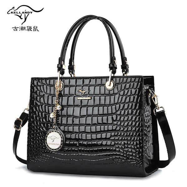 

brand big red bride bag china red tote portable diagonal patent leather bag middle-aged lady mother bag large capacity bucket bag. factory o