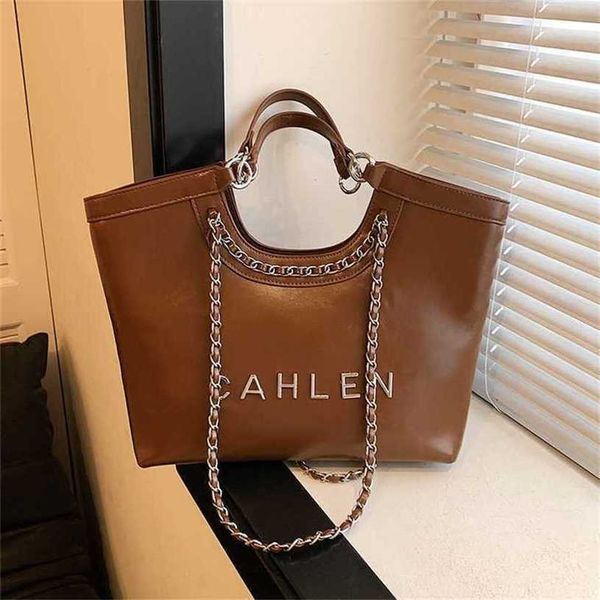 

18% off bag 2024 new launch designer handbag new women's small style wax leather diagonal straddle chain strap single shoulder wind