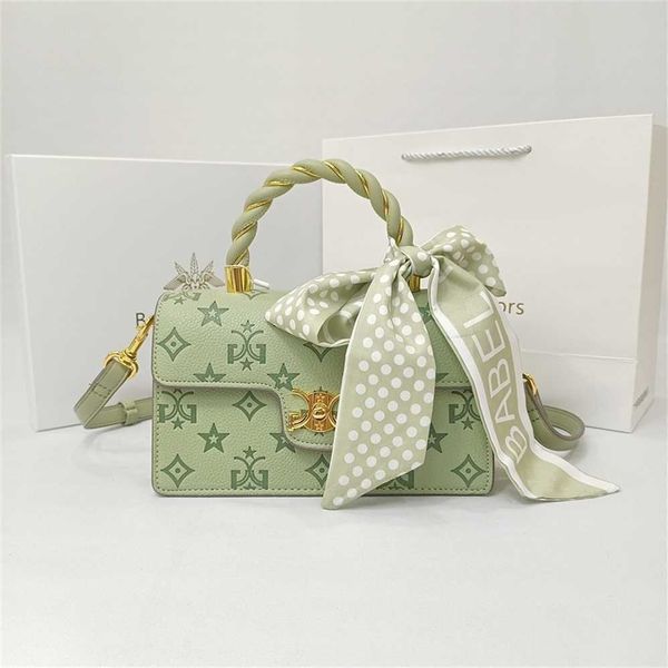 

luxury handbags sale light luxury, fresh sweet twist embossed skew across small green