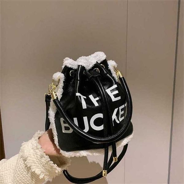 

12% off bag 2024 new launch designer handbag net red same little popular lamb hair letter handheld bucket female autumn winter korean one sh