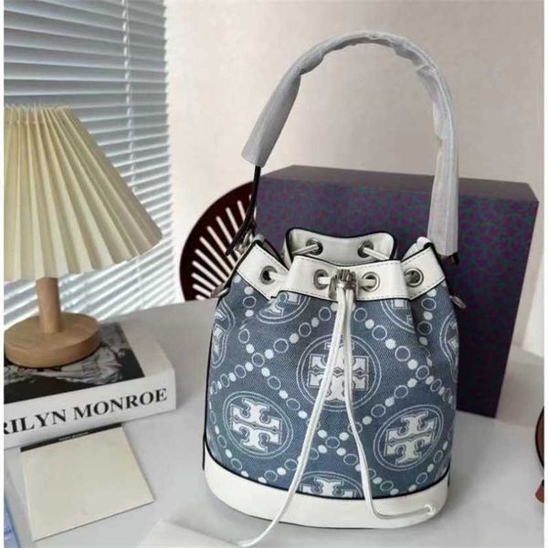 

26% off bag 2024 new launch designer handbag early launch tb women's old flower drawstring bucket fashion oblique straddle mini commute