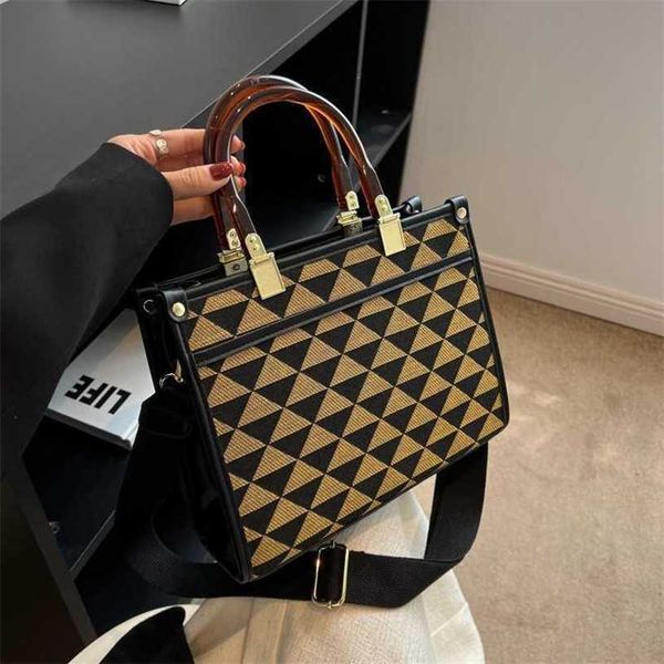 

18% off bag 2024 new launch designer handbag early launch handheld tote new type women's large capacity early autumn shoulder commuter