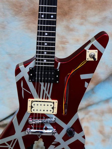

striped shark electric guitar, eddie van halen, metalic red/silver